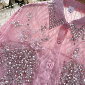 Camisa com Gola Alta, Bordados e Paetês – Elegância com Toque Brilhante