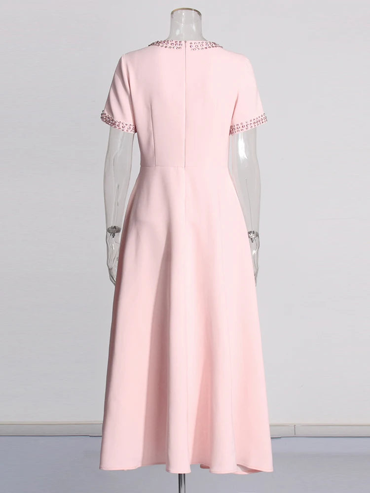 Vestido Elegante – Detalhe de Laço e Brilho Sofisticado