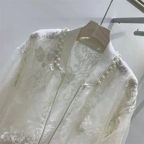 Jaqueta com Bordado e Pérolas – Elegância em um Só Look