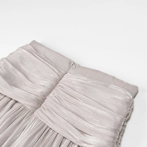 Conjunto Blusa e Saia Plissada - Brilho Sutil e Silhueta Moderna