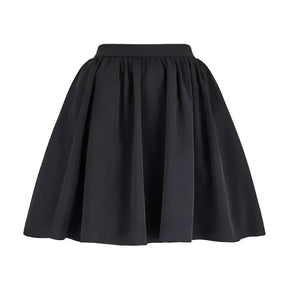 Conjunto Elegante de Top Halter com Flor de Strass e Saia de Cintura Alta – Coleção 2025
