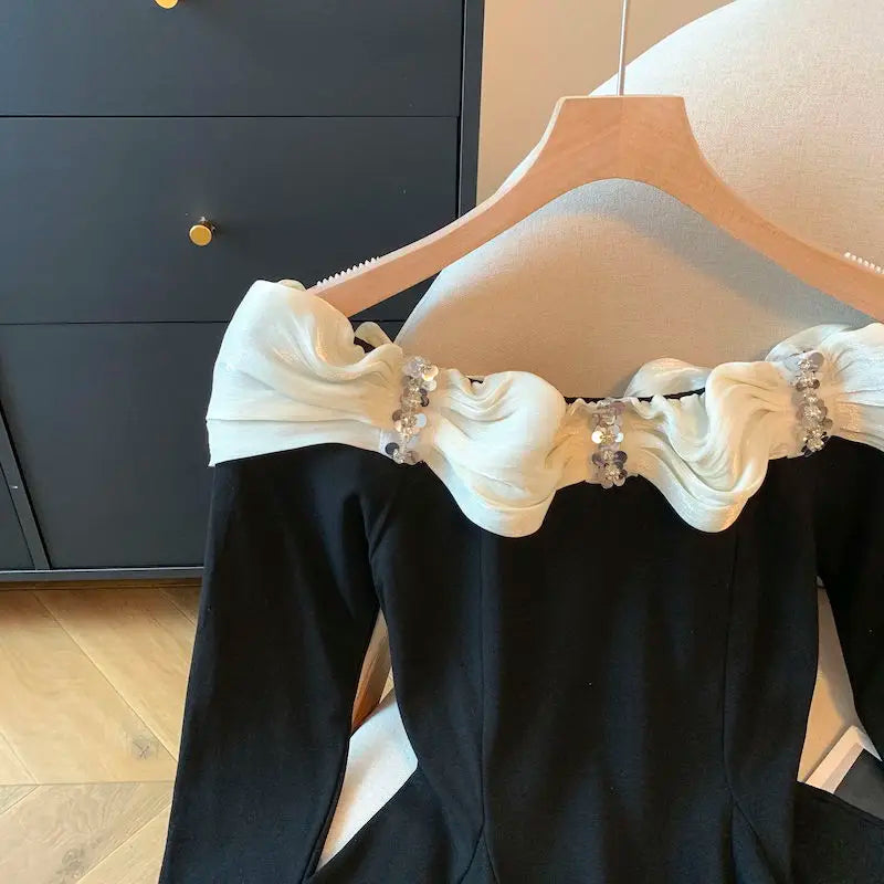 Blusa Elegante com Decote Ombro a Ombro e Detalhe Recortado