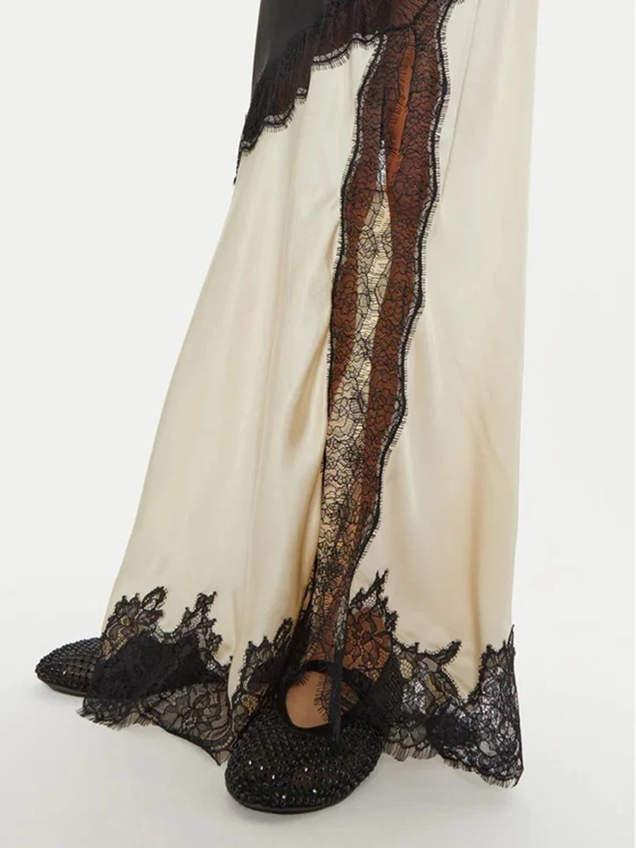 Vestido com Recortes Esculpidos em Renda e Elegância Patchwork