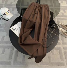 Conjunto Esportivo com Jaqueta Listrada e Calça Pantalona