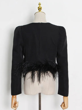 Blusa Minimalista com Plumas – Estilo e Sofisticação