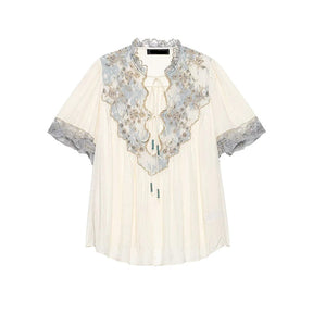 Blusa Fluida com Detalhes em Renda Floral e Decote em V
