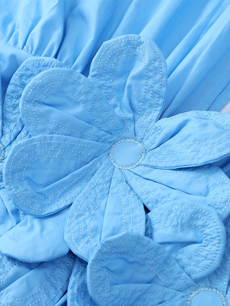 Vestido midi com flor - fluido novidade