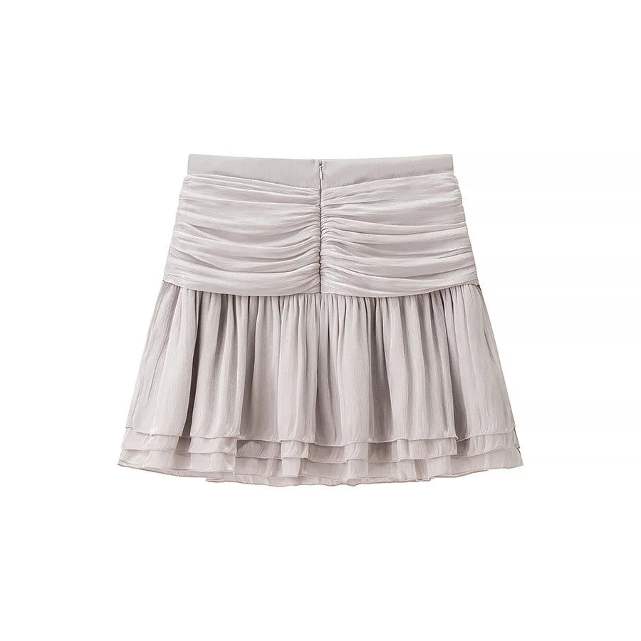 Conjunto Blusa e Saia Plissada - Brilho Sutil e Silhueta Moderna