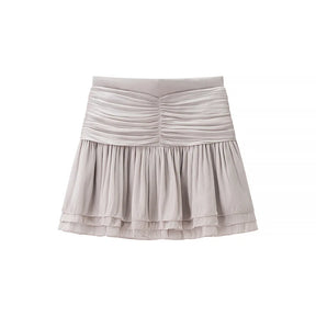 Conjunto Blusa e Saia Plissada - Brilho Sutil e Silhueta Moderna