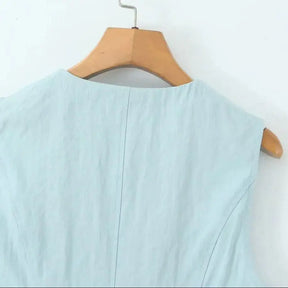 Conjunto – Colete Sem Mangas + Saia plissada com Bolsos