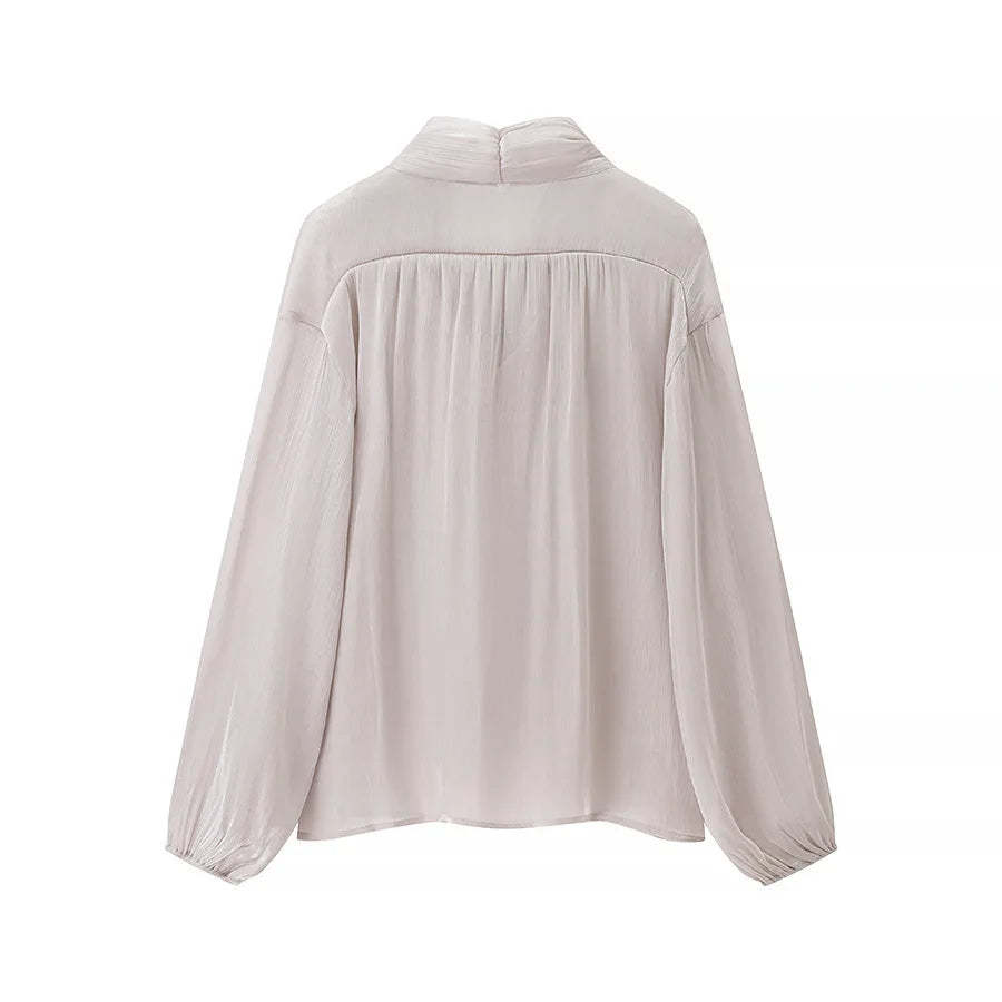 Conjunto Blusa e Saia Plissada - Brilho Sutil e Silhueta Moderna