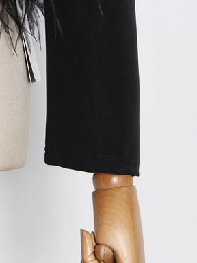 Blusa Minimalista com Plumas – Estilo e Sofisticação