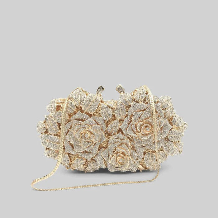 Bolsa clutch com enfeite de cristal