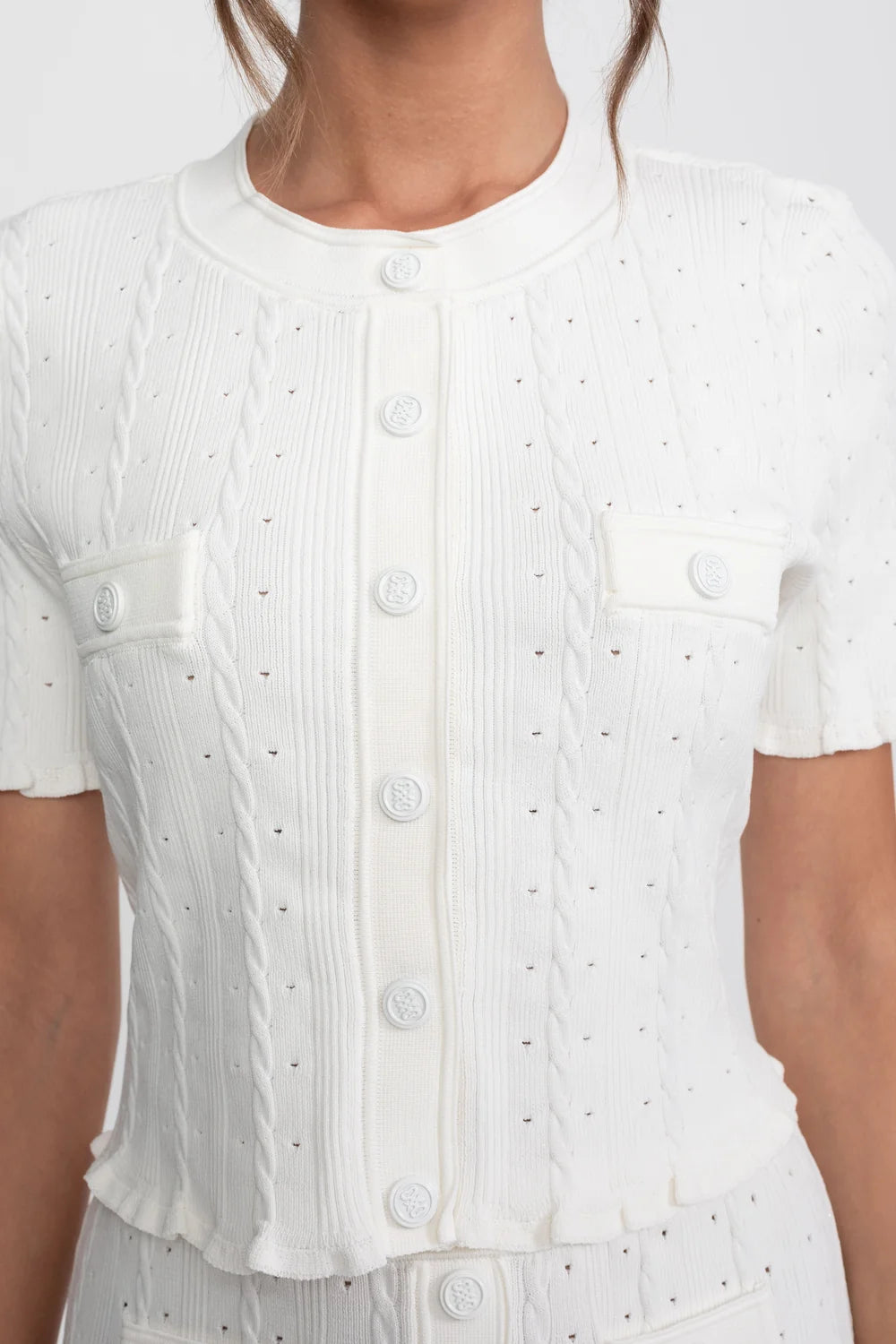 Conjunto Elegante em Tricot com Manga Curta e Saia