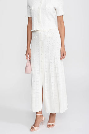 Conjunto Elegante em Tricot com Manga Curta e Saia