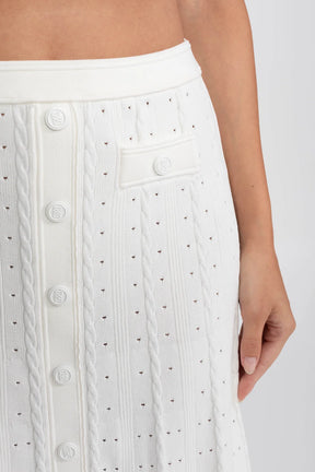 Conjunto Elegante em Tricot com Manga Curta e Saia